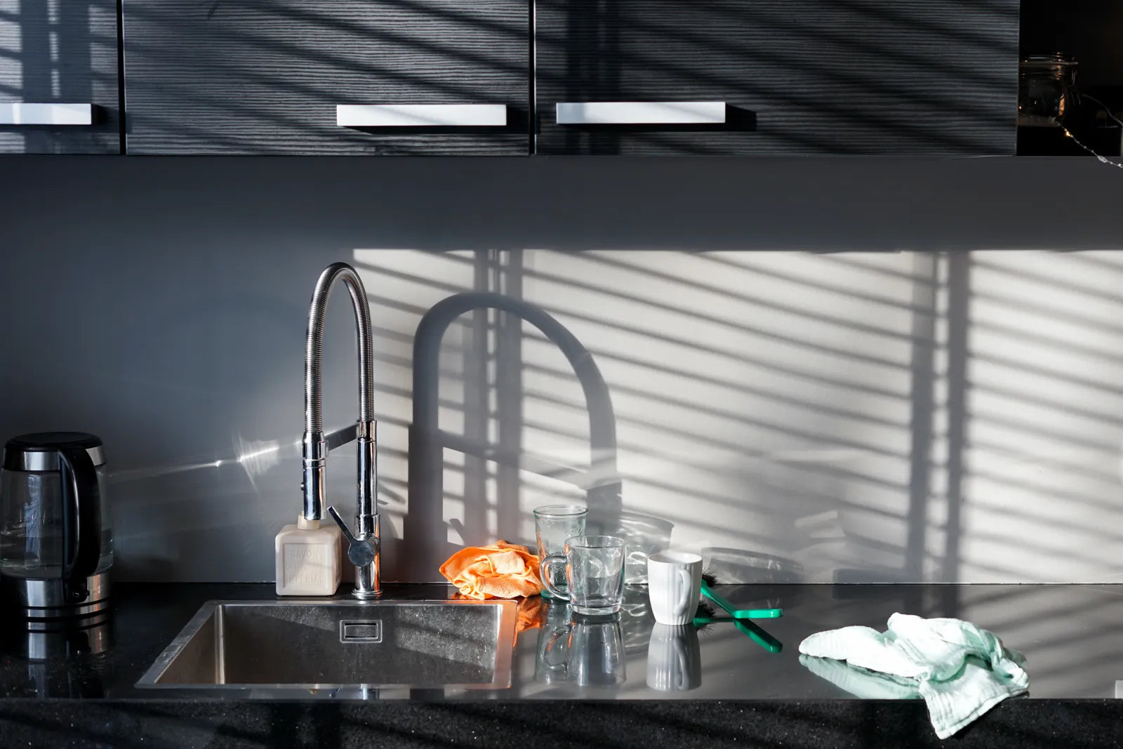 A Florida kitchen sink setup uses a filter to treat local tap water effectively.