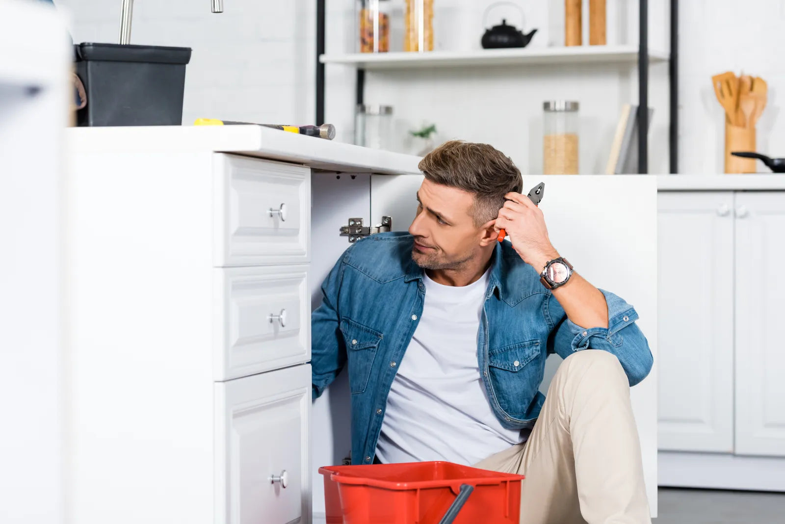 Homeowner troubleshoots under-cabinet plumbing to locate RO system gurgling noise root cause