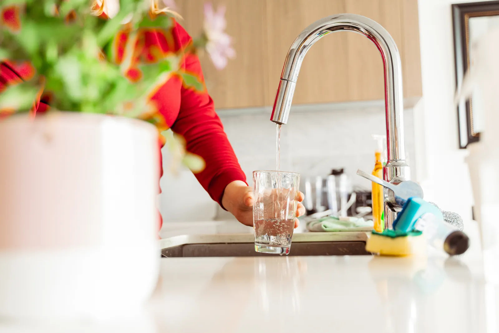 A Glass of Clean Drinking Water on a Table: Choosing the Right Home Water Filtration System